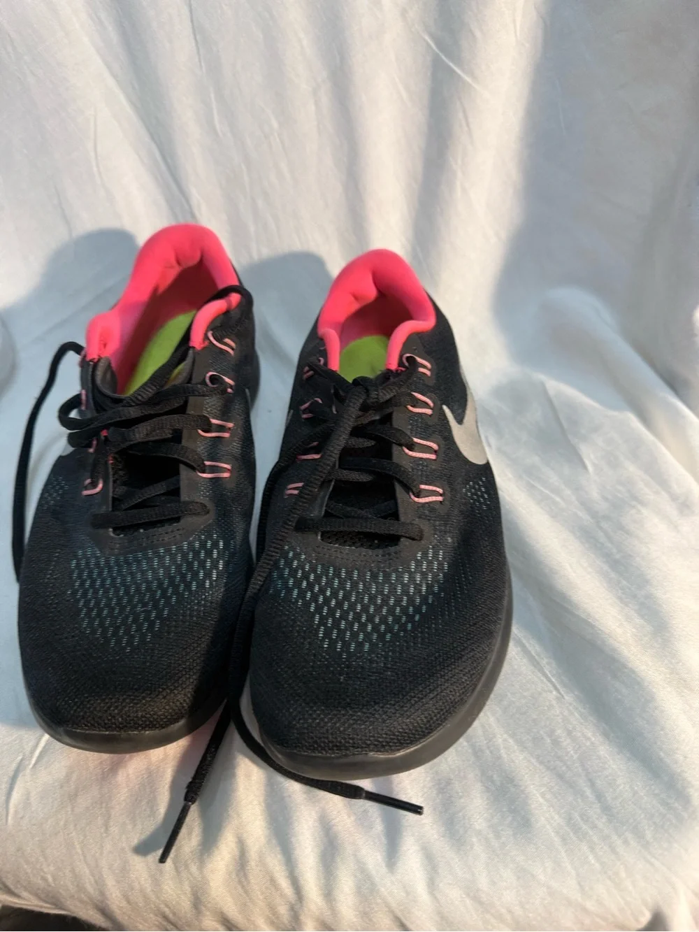 Nike Black Athletic Shoes with Pink Accents